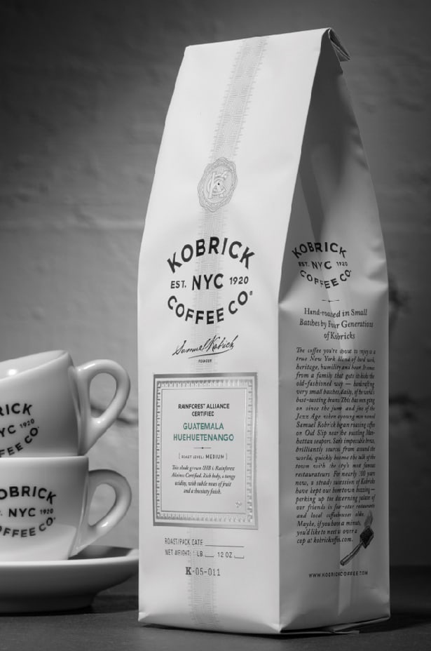 Kobrick Coffee Co. bag and coffee cup design detail