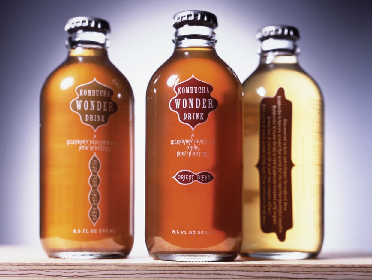 closeup of Kombucha Wonder Drink beverage bottle designs