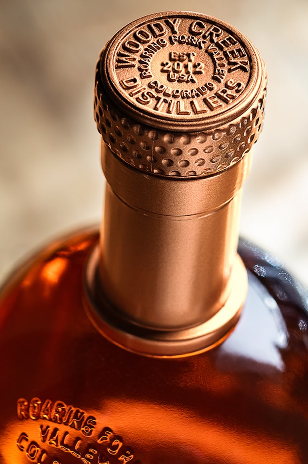 closeup of Woody Creek Distillers whiskey bottle design